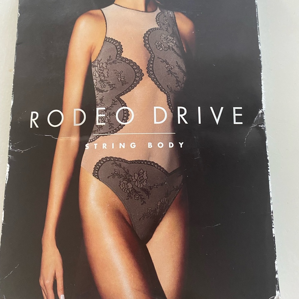 Wolford sheer bodysuit.